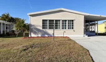 606 Dolphin Cir, Barefoot Bay, FL 32976