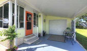 711 Amaryllis Dr, Barefoot Bay, FL 32976