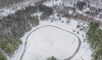 8074 Grosbeak Dr NW, Alden, MI 49612