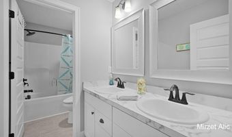 5220 Canyon River Dr NE, Ada, MI 49301