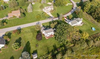 2264 Grand Valley Dr NE, Ada, MI 49301