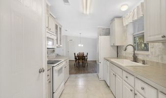 414 Macadamia Dr, Barefoot Bay, FL 32976