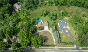 5855 Grand River Dr NE, Ada, MI 49301