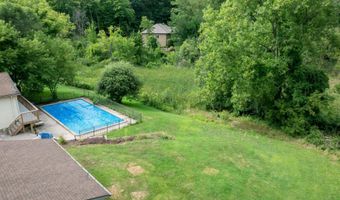 5855 Grand River Dr NE, Ada, MI 49301