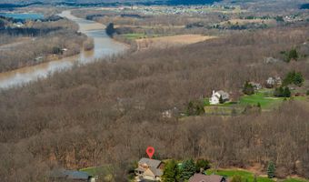 5254 Canyon River Dr NE, Ada, MI 49301