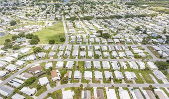 818 Thrush Cir, Barefoot Bay, FL 32976