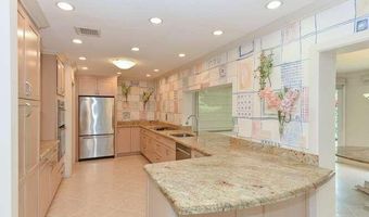 437 French Royale Cir, Atlantis, FL 33462