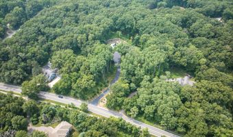 259 Grand River Dr NE, Ada, MI 49301
