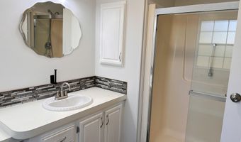 606 Dolphin Cir, Barefoot Bay, FL 32976