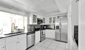 450 French Royale Cir, Atlantis, FL 33462