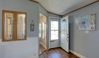 561 Dolphin Cir, Barefoot Bay, FL 32976