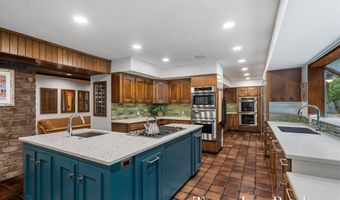 410 Greentree Ln NE, Ada, MI 49301