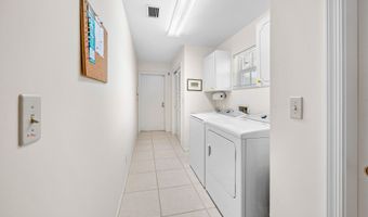 489 S Country Club Dr, Atlantis, FL 33462