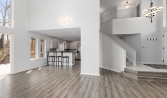 7721 Sun Quest Ridge Dr NE, Ada, MI 49301