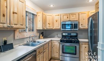 589 Grand River Dr NE, Ada, MI 49301