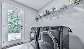 221 Woods Cir, Ball Ground, GA 30107