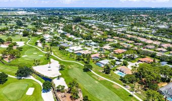 489 S Country Club Dr, Atlantis, FL 33462