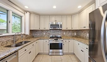 8241 W Pomona Dr, Arvada, CO 80005