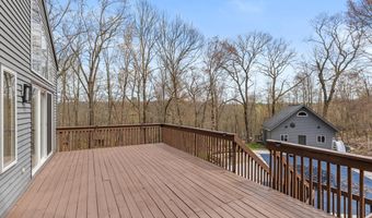7721 Sun Quest Ridge Dr NE, Ada, MI 49301