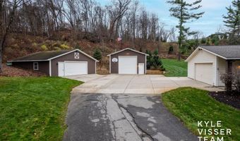 589 Grand River Dr NE, Ada, MI 49301