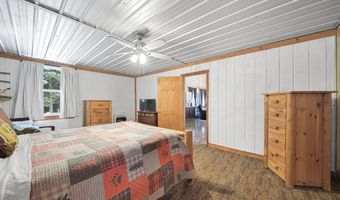 8074 Grosbeak Dr NW, Alden, MI 49612