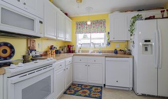 818 Thrush Cir, Barefoot Bay, FL 32976