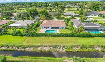 524 Muirfield Dr, Atlantis, FL 33462