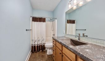 8891 O'NEAL WOODS Ct SE, Alto, MI 49302