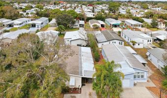 566 Dolphin Cir, Barefoot Bay, FL 32976