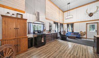 8074 Grosbeak Dr NW, Alden, MI 49612