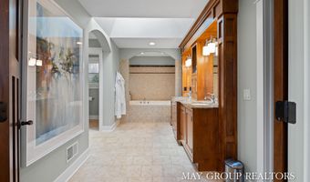 5254 Canyon River Dr NE, Ada, MI 49301