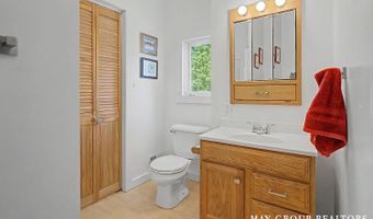 665 Honey Creek Ave NE, Ada, MI 49301
