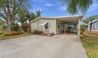 566 Dolphin Cir, Barefoot Bay, FL 32976