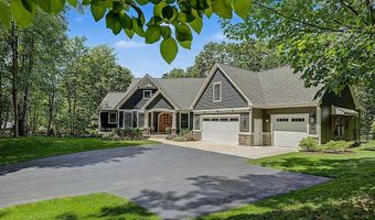 547 Roundtree Dr NE, Ada, MI 49301