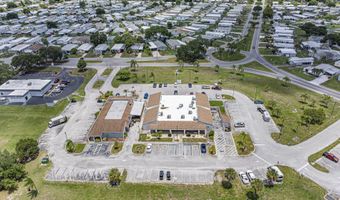 818 Thrush Cir, Barefoot Bay, FL 32976