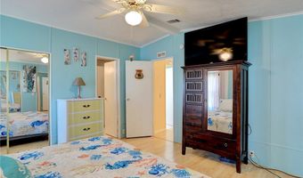 711 Amaryllis Dr, Barefoot Bay, FL 32976