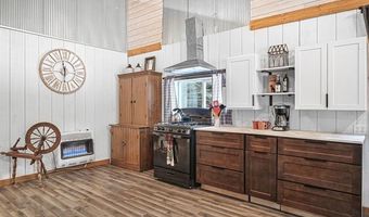 8074 Grosbeak Dr NW, Alden, MI 49612