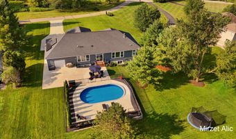 5220 Canyon River Dr NE, Ada, MI 49301