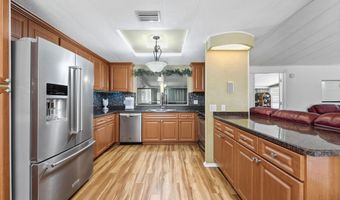 566 Dolphin Cir, Barefoot Bay, FL 32976