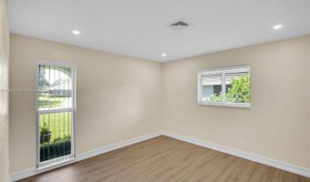 524 Muirfield Dr, Atlantis, FL 33462