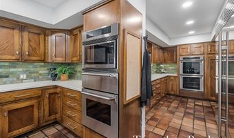 410 Greentree Ln NE, Ada, MI 49301