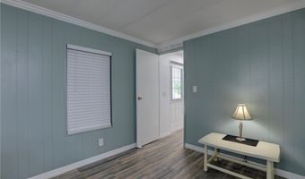906 Wren Cir, Barefoot Bay, FL 32976