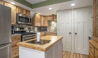 7160 River Valley Dr SE, Alto, MI 49302