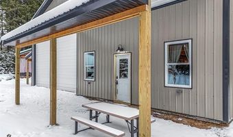 8074 Grosbeak Dr NW, Alden, MI 49612