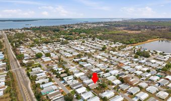 566 Dolphin Cir, Barefoot Bay, FL 32976
