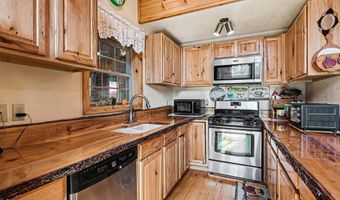 1900 N Forest Lake Dr, Alger, MI 48610