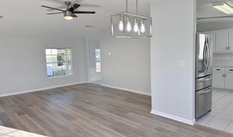 606 Dolphin Cir, Barefoot Bay, FL 32976