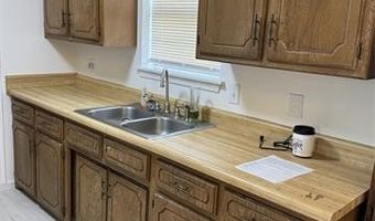 306 E Main, Achille, OK 74720
