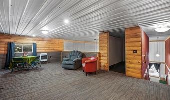 8074 Grosbeak Dr NW, Alden, MI 49612