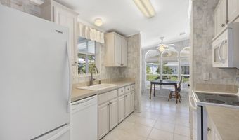 414 Macadamia Dr, Barefoot Bay, FL 32976